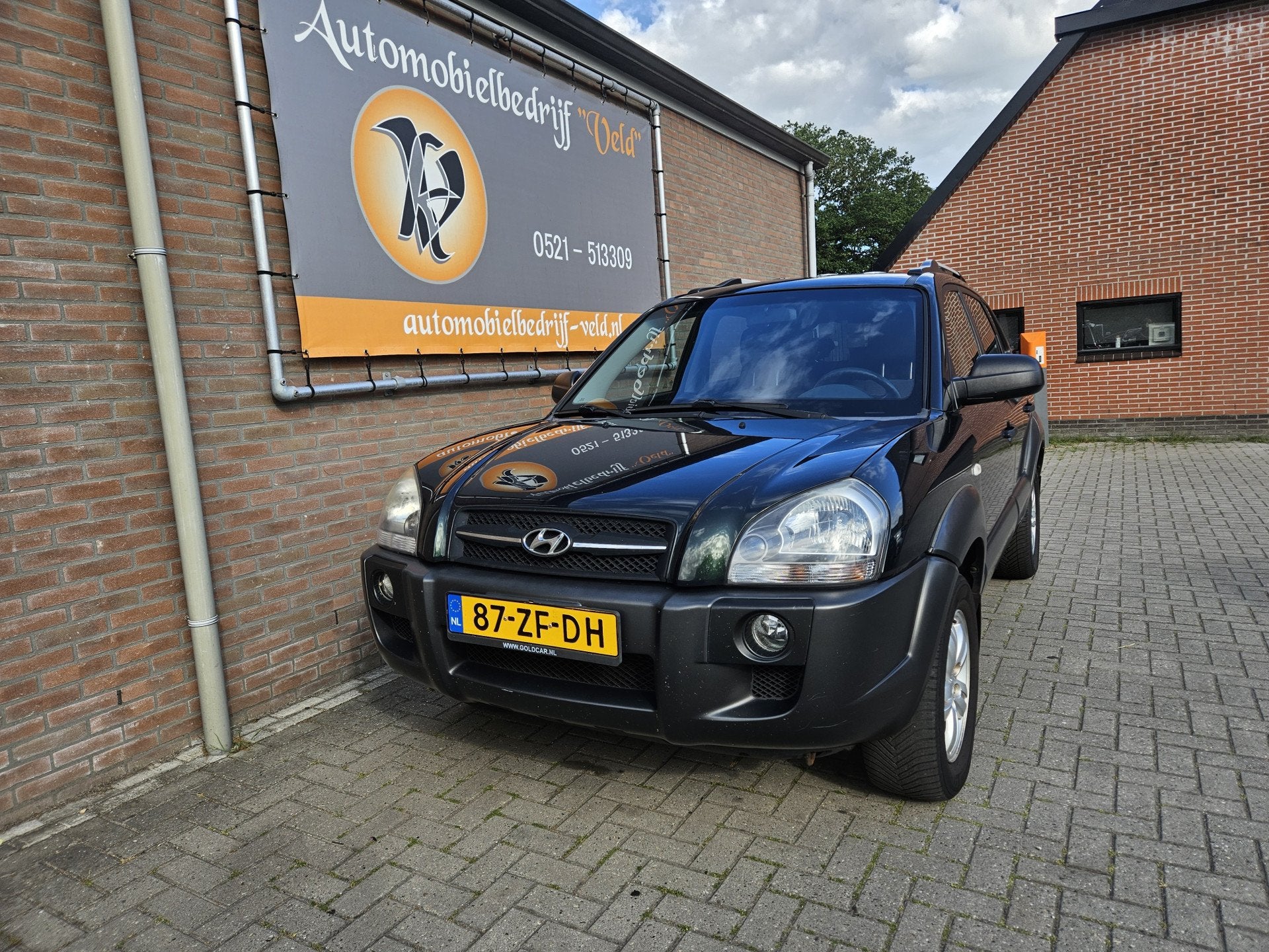 Hyundai Tucson 2.0i Dynamic (bj 2008), Stof, Gebruikt, Zwart, 4 cilinders