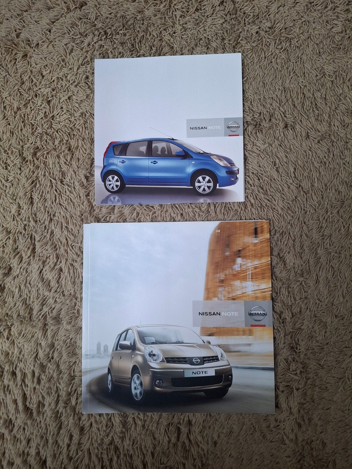 2x autofolder Nissan Note, Verzenden, Zo goed als nieuw, Nissan
