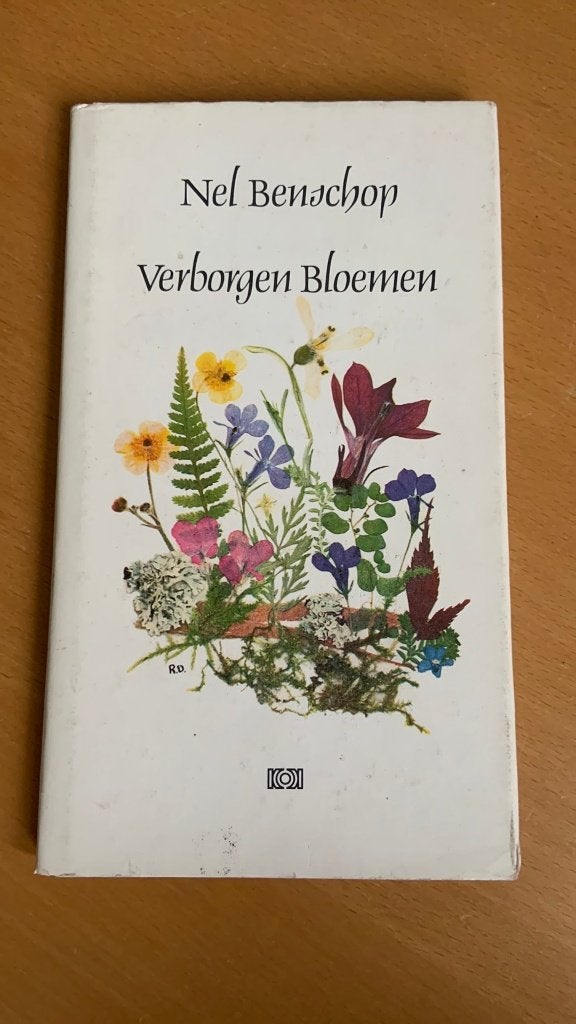 Verborgen bloemen - Nel Benschop, Ophalen of Verzenden, Zo goed als nieuw