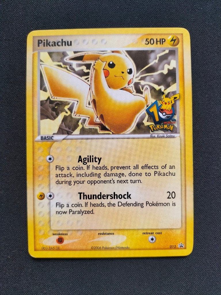 Pikachu #12 Pokemon Promo, Ophalen of Verzenden, Zo goed als nieuw, Losse kaart, Foil