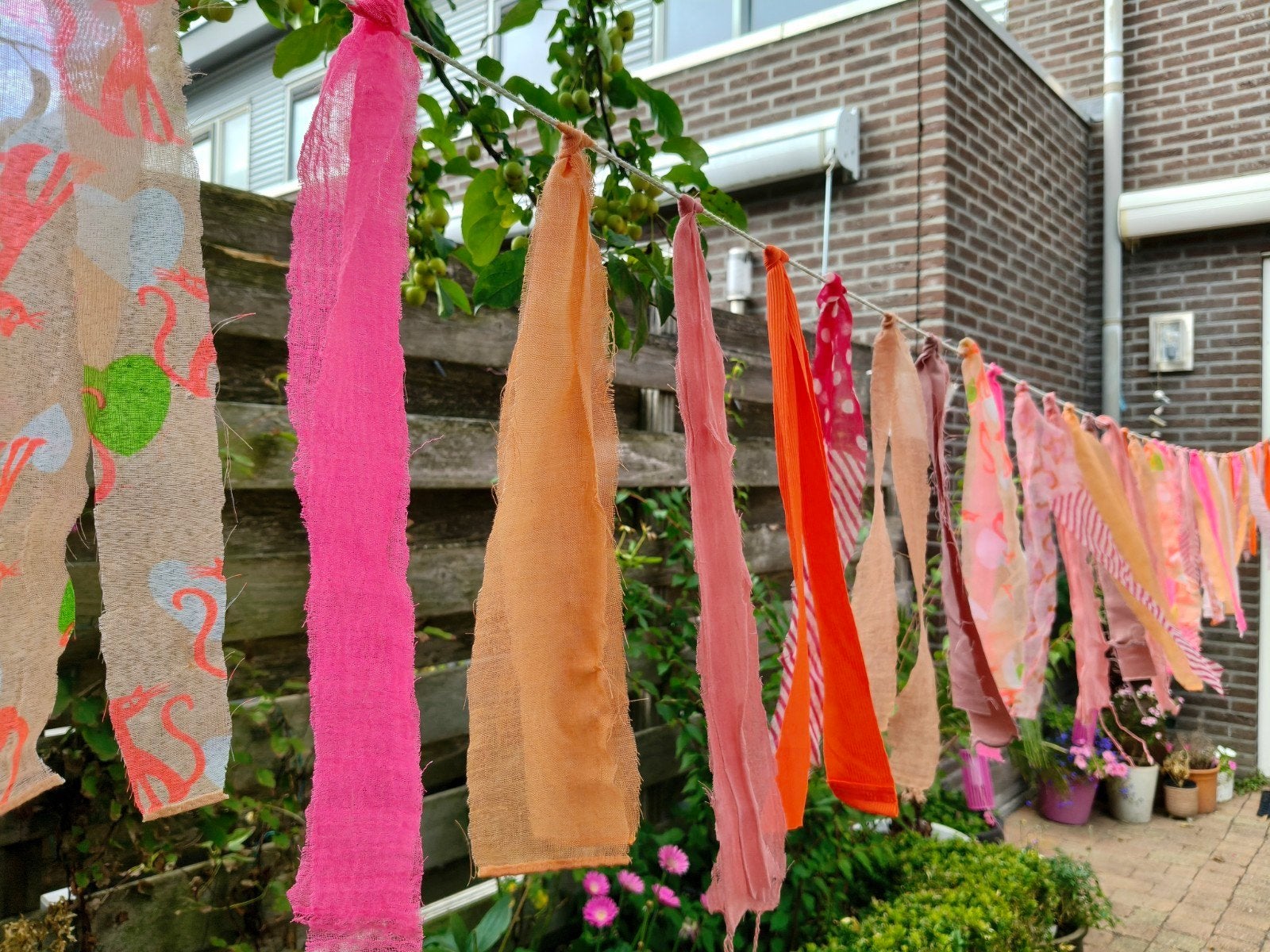 Ibiza slinger roze / oranje 7 mtr, Ophalen of Verzenden, Nieuw, Versiering