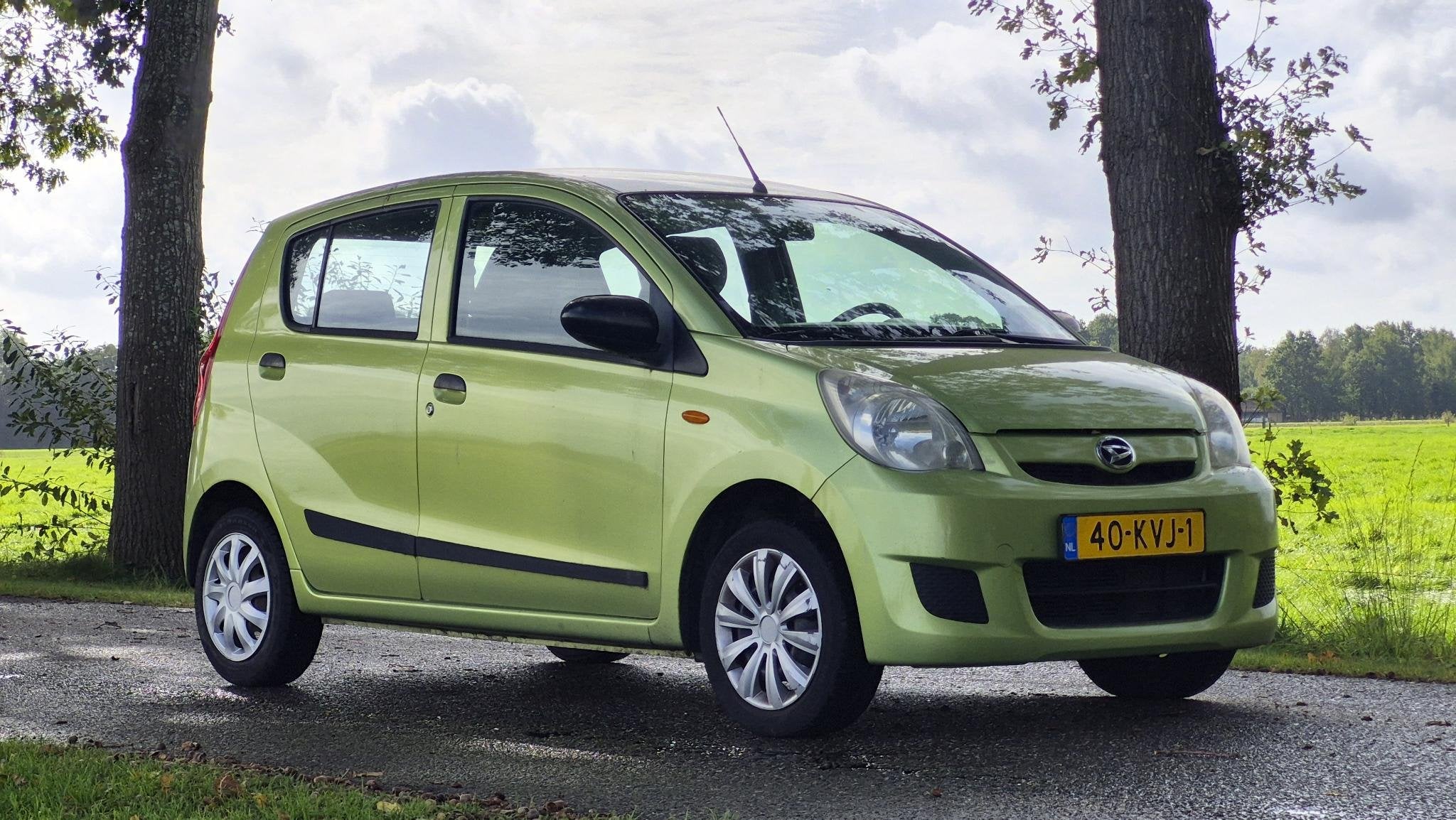 Daihatsu Cuore 1.0 Comfort APK 28-9-2027 I Airco I Trekhaak, Auto's, Voorwielaandrijving, Stof, 18 €/maand, 4 stoelen