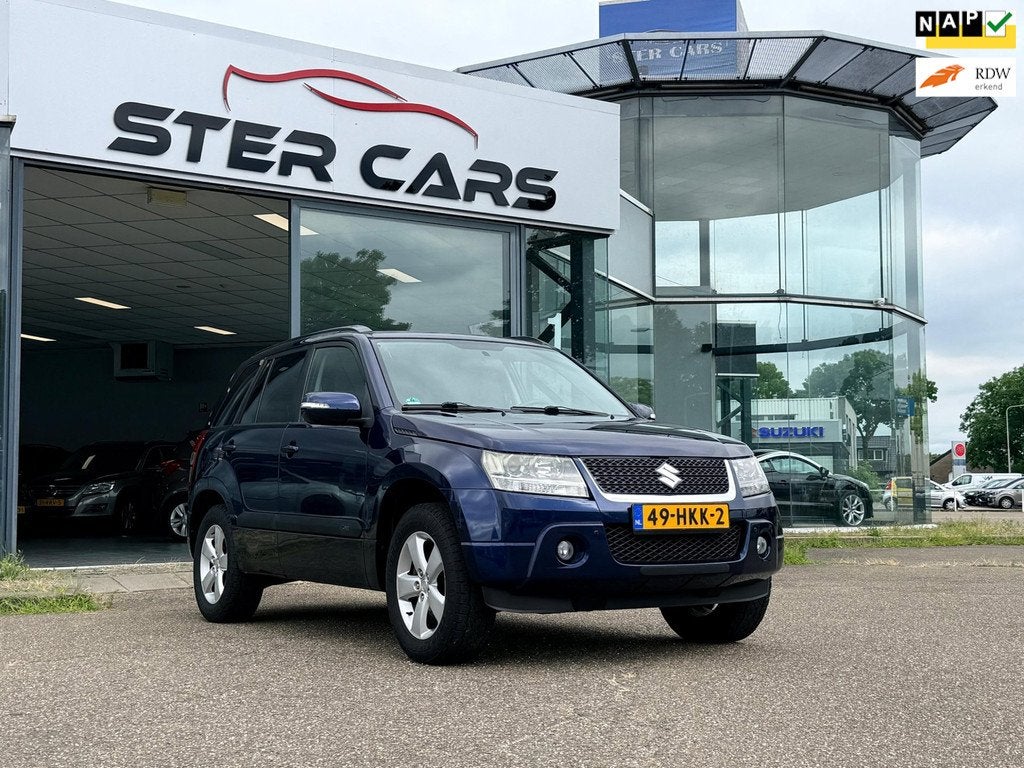 Suzuki Grand Vitara 2.4 Exclusive|4x4|Automaat|Navi|Trekhaak, Auto's, Suzuki, Automaat, Gebruikt, 4 cilinders, Bedrijf