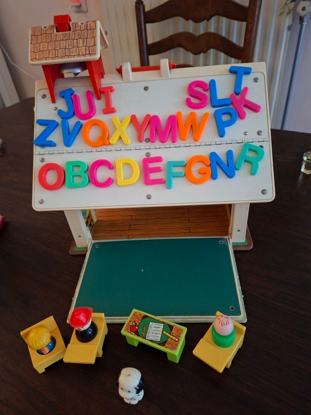 Fisher  price schooltje, Ophalen