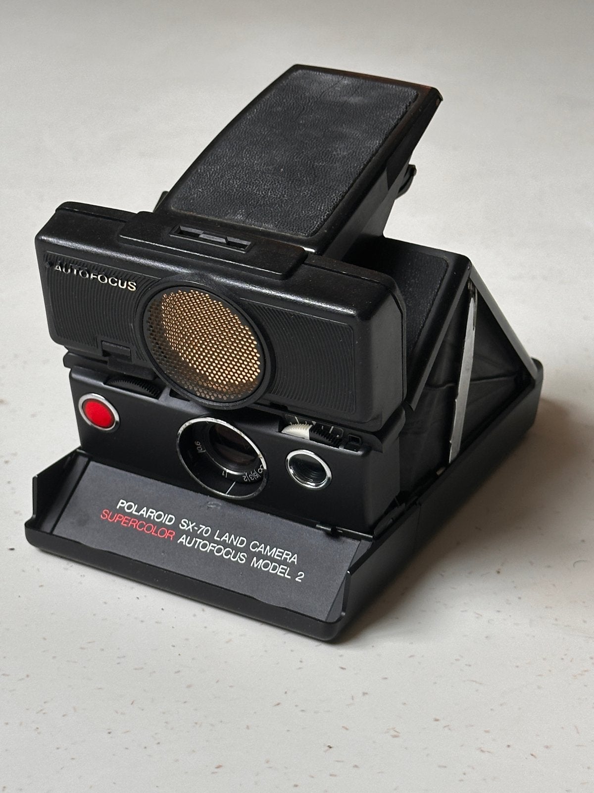 Polaroid SX-70 Land Camera Supercolor Autofocus Model 2, Ophalen of Verzenden, Gebruikt, Polaroid