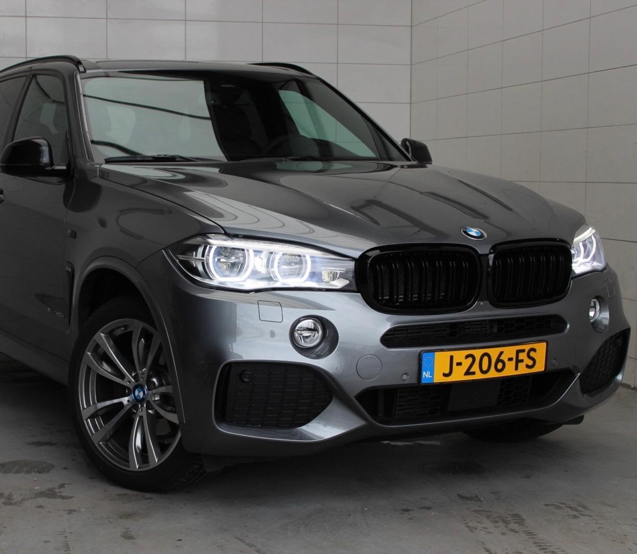 BMW X5 Xdrive40e Iperformance 313pk Aut 2015 Grijs, Auto's, Dealer onderhouden, 4 cilinders, Vierwielaandrijving, Lichtsensor
