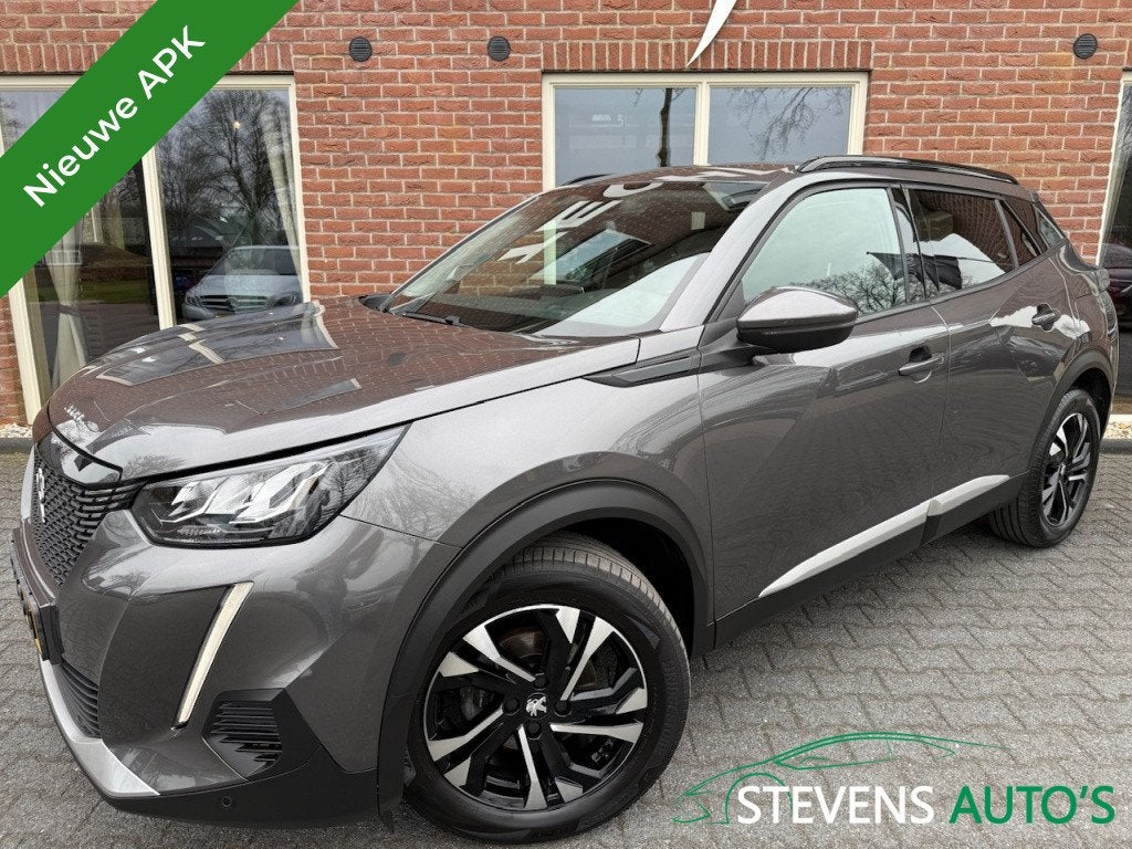Peugeot 2008 1.2 PureTech Allure VIRTUAL.COCKPIT / HALF.LEER, Auto's, 1163 kg, Gebruikt, 1199 cc, Leder en Stof