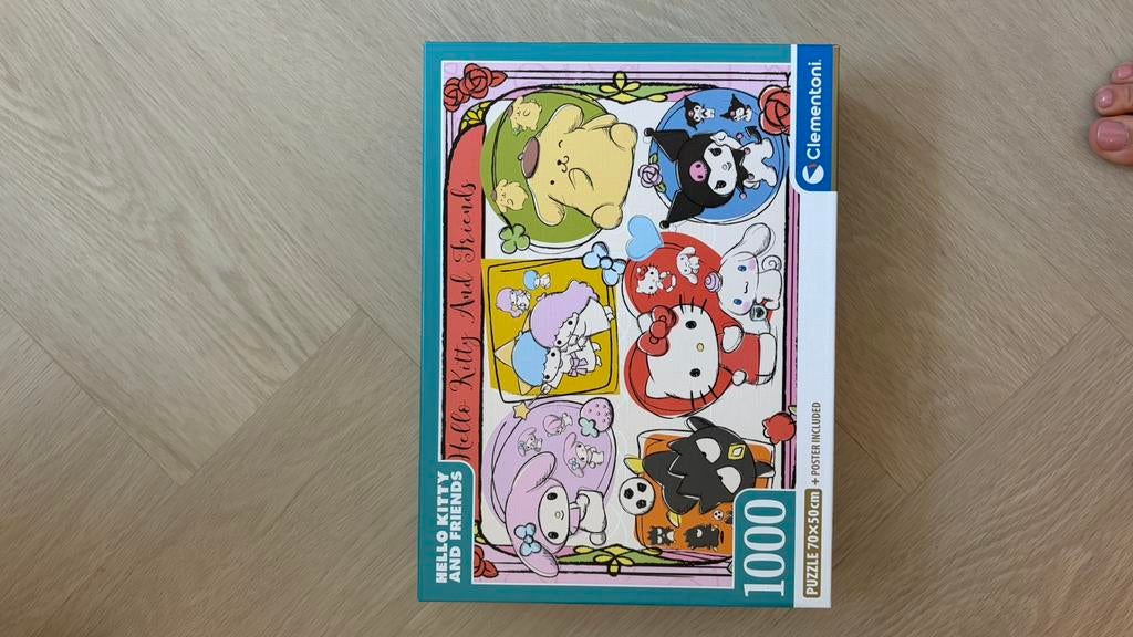 Puzzel hello kitty en bloemen, Ophalen of Verzenden, 500 t/m 1500 stukjes, Zo goed als nieuw