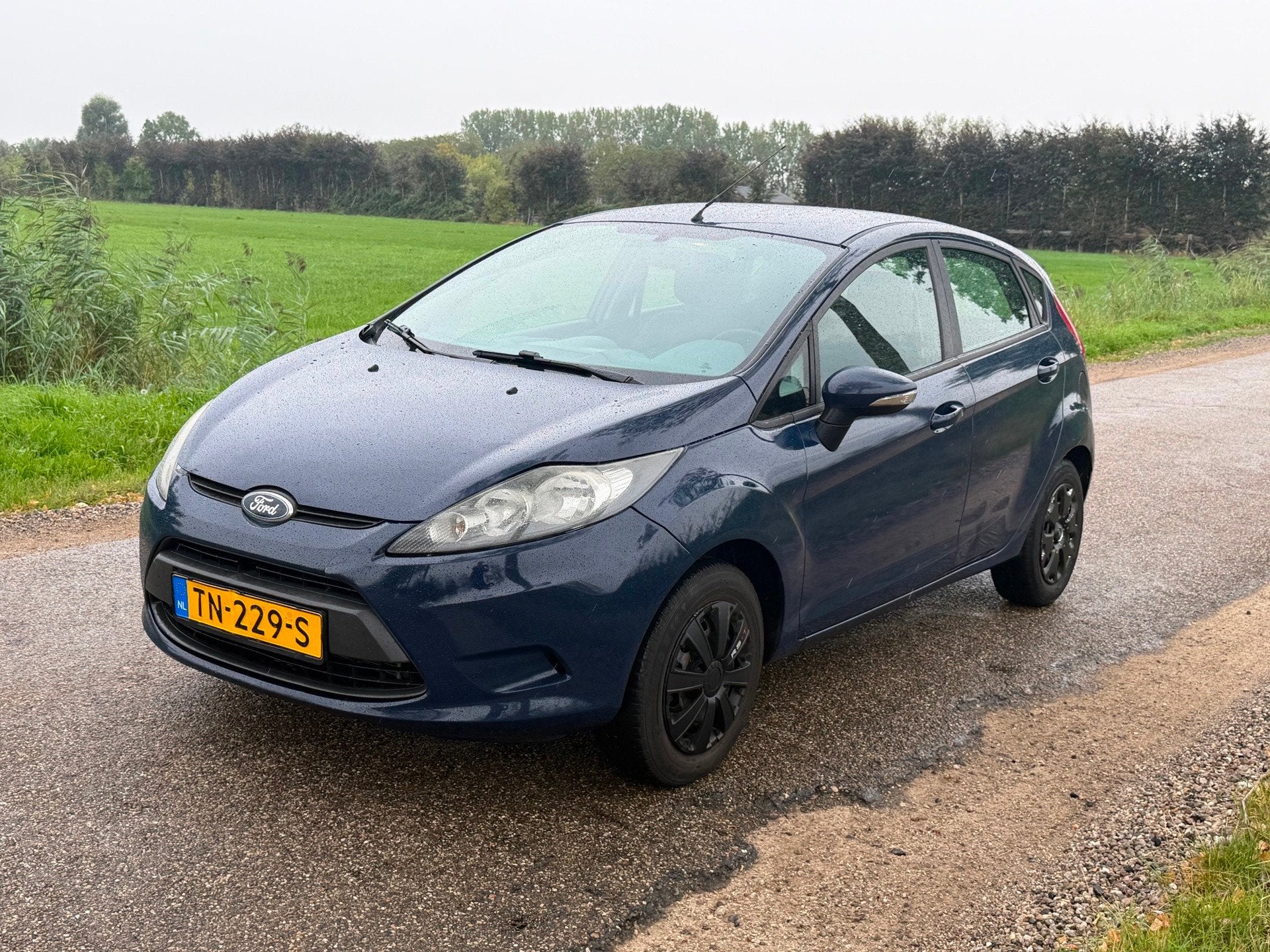 Ford Fiesta 1.25 Ghia 5 Drs APK 09-2026 Airco, Voorwielaandrijving, Euro 5, Stof, Bedrijf