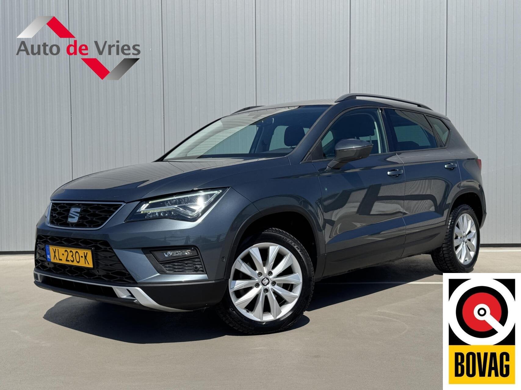 Seat Ateca 1.5 TSI Style Business Intense|NL-Auto|Navi, Auto's, Dealer onderhouden, Stof, 4 cilinders, Automatische klimaatregeling