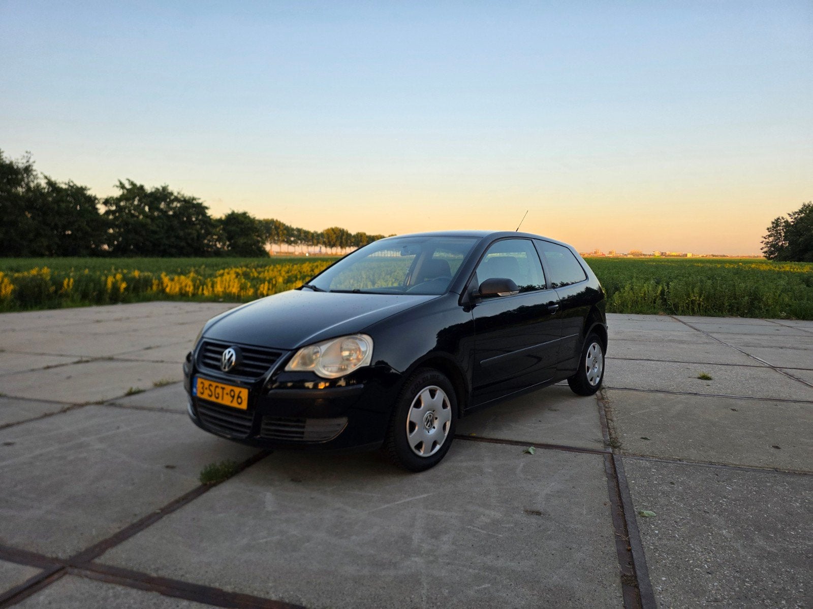 Volkswagen Polo 1.2 51KW 2008 Zwart, Voorwielaandrijving, Stof, 540 kg, 1198 cc