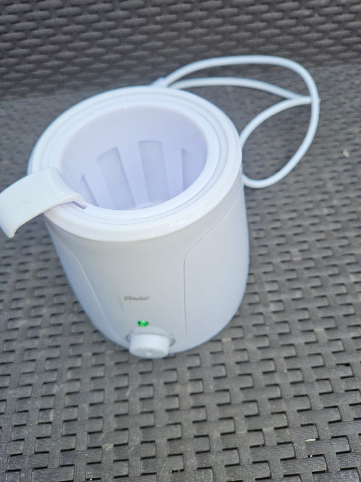 Flessen- en potjeswarmer, Ophalen