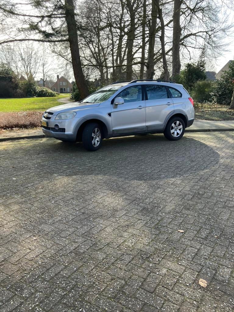 Chevrolet Captiva 2.4 4WD 2007 zilver Grijs, Auto's, Chevrolet, Euro 5, Zwart, 4 cilinders, 7 stoelen