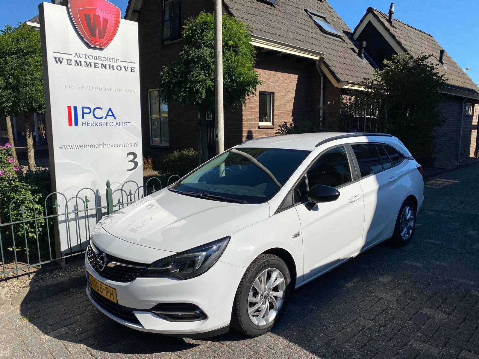 Opel Astra Sports Tourer 1.2 Business Edition (bj 2021), Auto's, 12 maanden, Stof, Gebruikt, 1199 cc