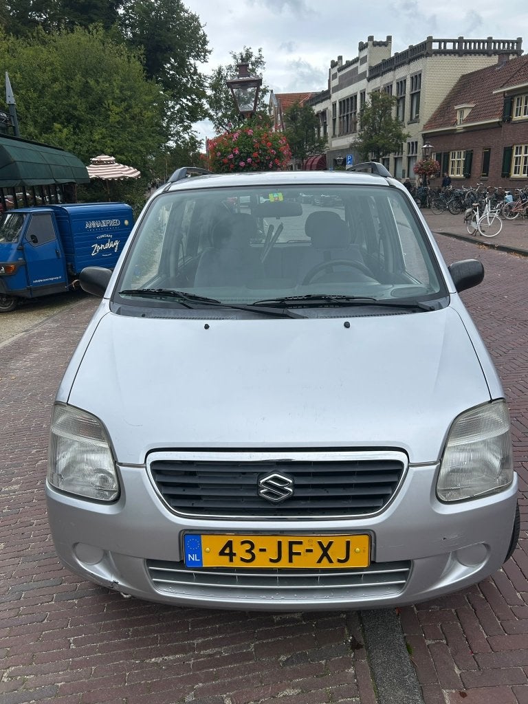Suzuki Wagon R+ 1.3 AUTMAAT 2002 Grijs, Auto's, Stof, 40 €/maand, 4 cilinders, Origineel Nederlands