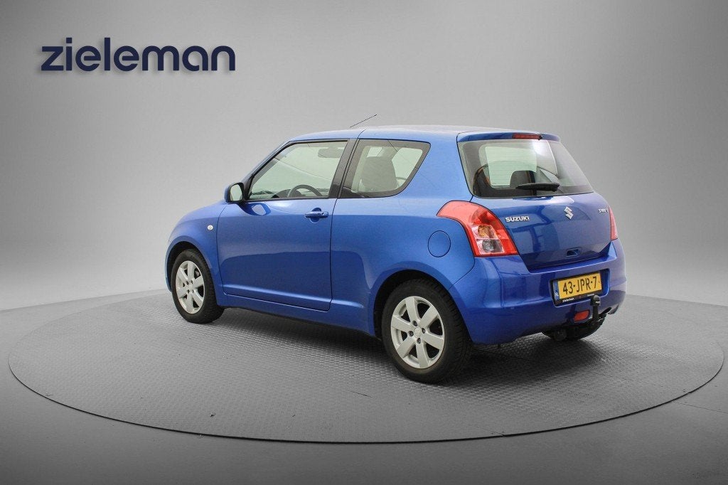 Suzuki SWIFT 1.3 Exclusive Automaat - Airco, Trekhaak, Auto's, Automaat, Huisgarantie, Met garantie (alle), Blauw