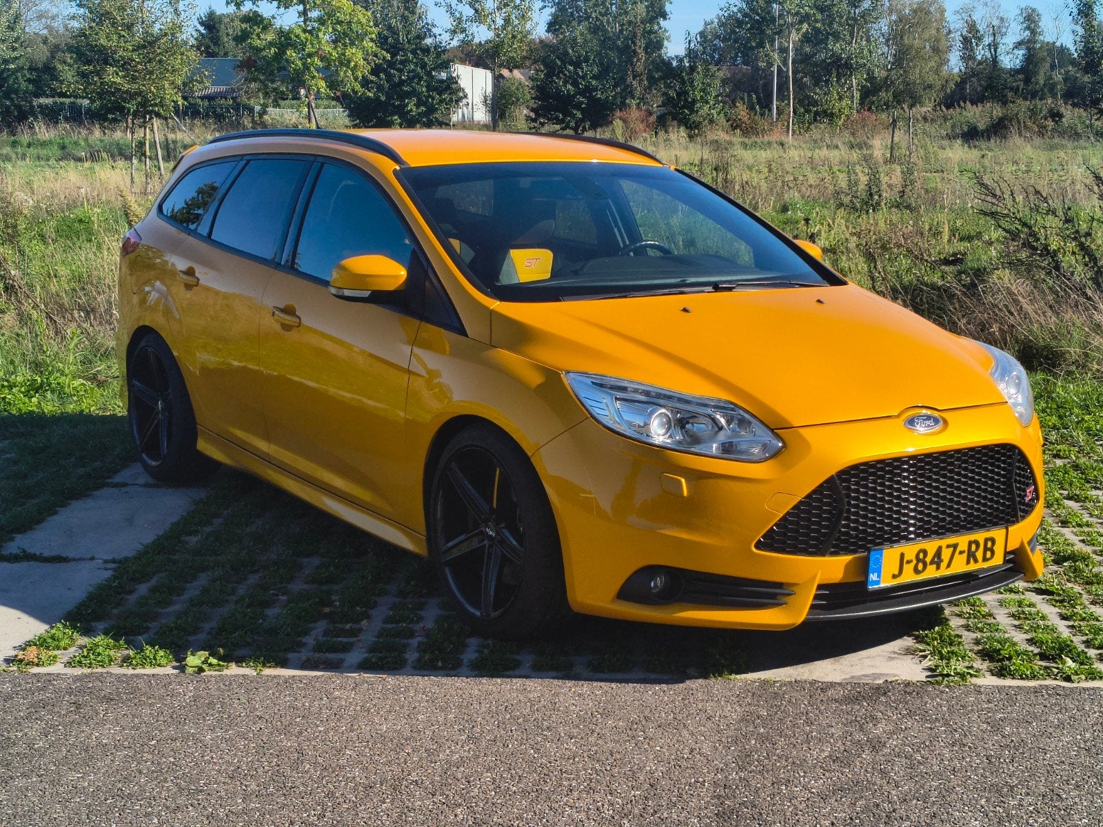 Ford Focus ST Wagon 2.0 EcoBoost 250pk| Bi-Xenon| Milltek, Auto's, Euro 5, Zwart, 4 cilinders, Leder en Stof