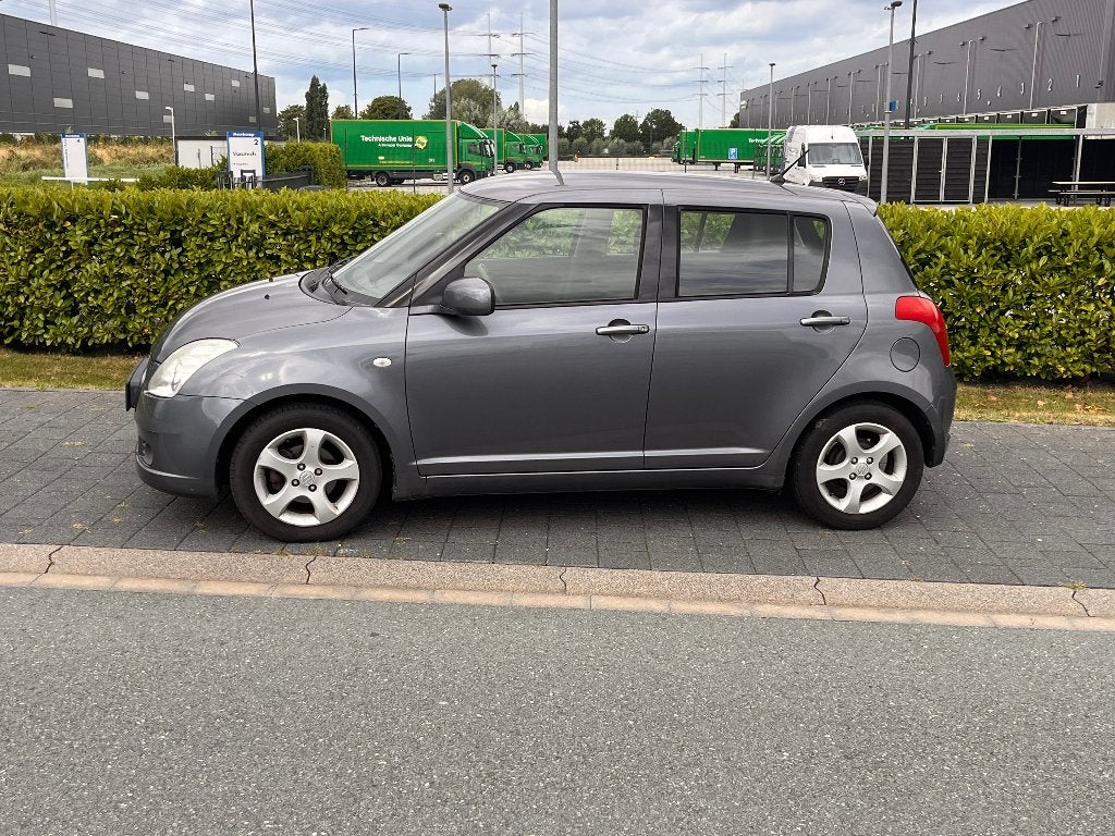 Suzuki Swift 1.3 5DRS, Grijs, airco, VERKOCHT!, Voorwielaandrijving, Stof, Zwart, 965 kg