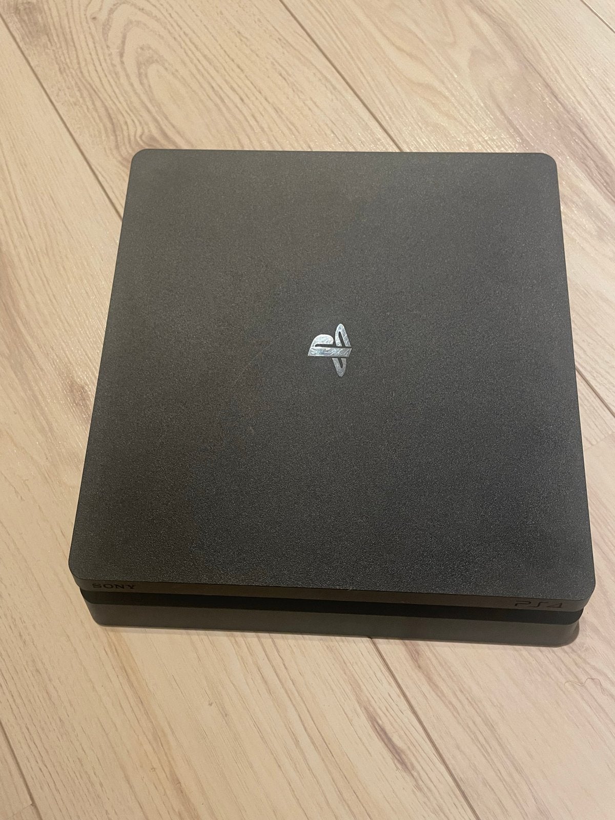 Foto 4 van Sony PlayStation 4 Slim 500GB met 1 controller