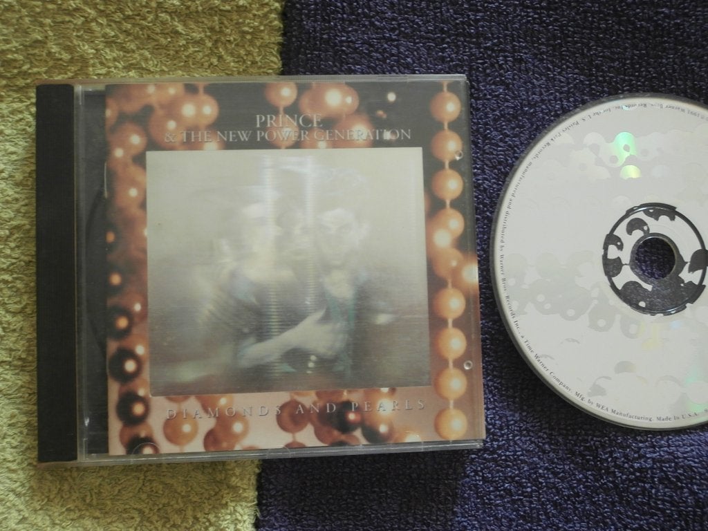 CD - Prince & The New Power Generation - Diamonds And Pearls, Cd's en Dvd's, Pop, Ophalen of Verzenden, Zo goed als nieuw, Inclusief boekje