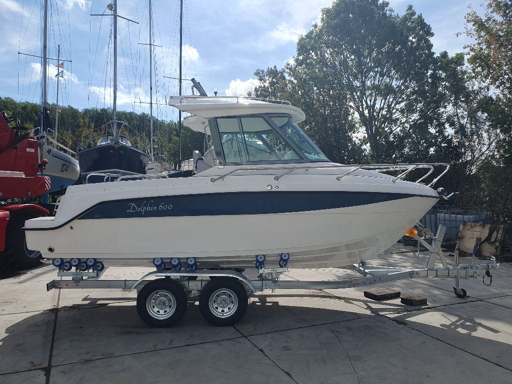 Polyesterboot Pilothouse Dolphin 600 van Xavier Watersports, Watersport en Boten, Vis- en Consoleboten, 70 pk of meer, Overige merken