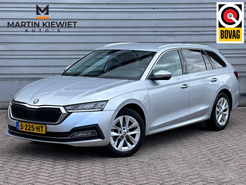 Skoda Octavia Combi 1.5 e-TSI Business Edition Plus|Trekhaak, Auto's, Skoda, Stof, 4 cilinders, 1316 kg, Hybride Elektrisch/Benzine