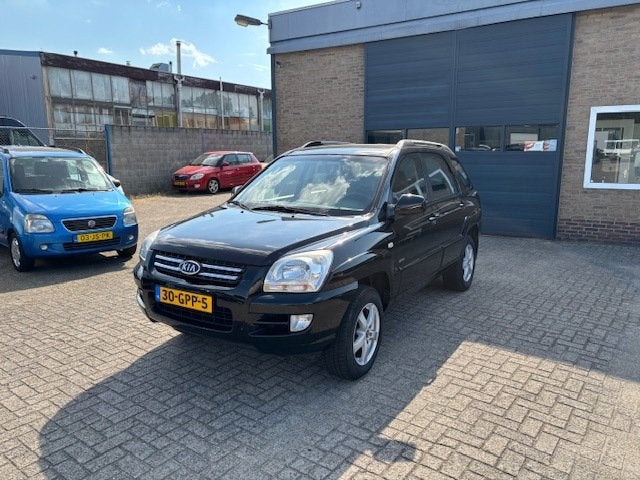Kia Sportage 2.0 CVVT 4WD//Clima//Trekhaak, Auto's, Kia, Voorwielaandrijving, Gebruikt, Zwart, 4 cilinders