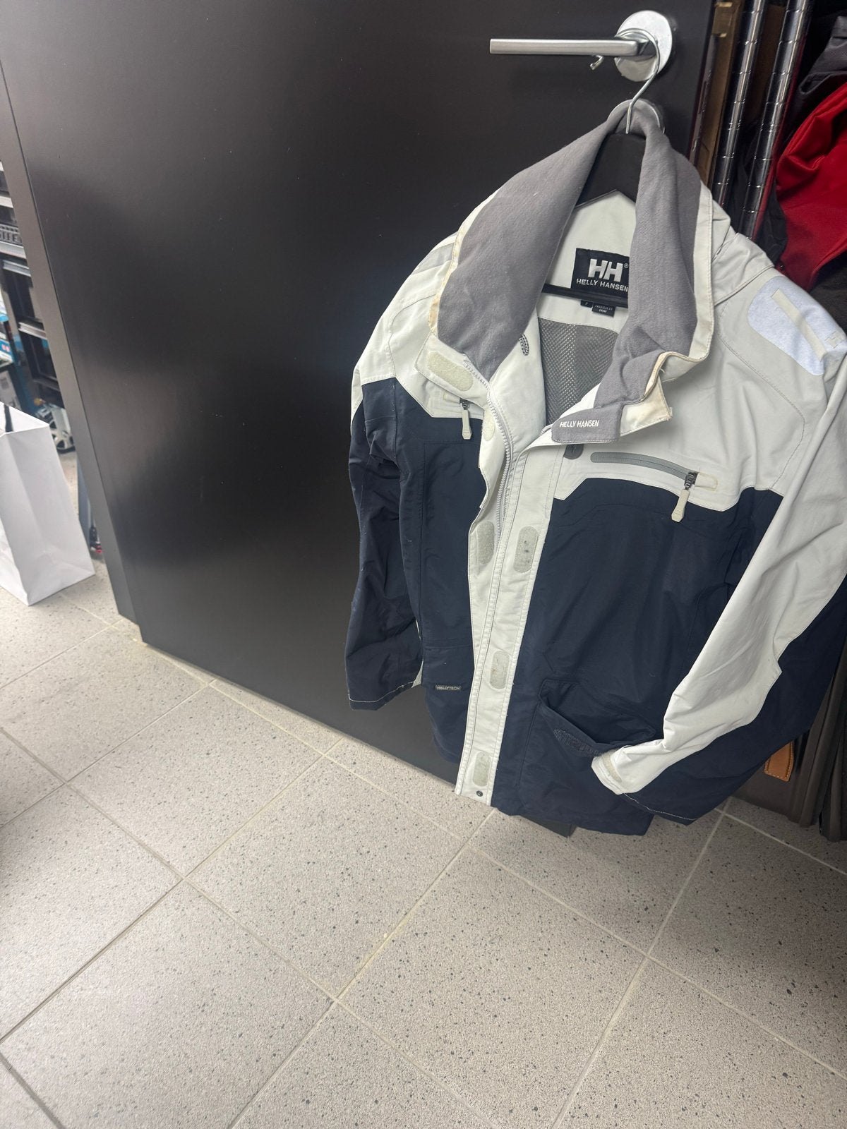 Helly Hansen jas - Maat L - Zo goed als nieuw, Ophalen, Gedragen, Maat 52/54 (L), Blauw