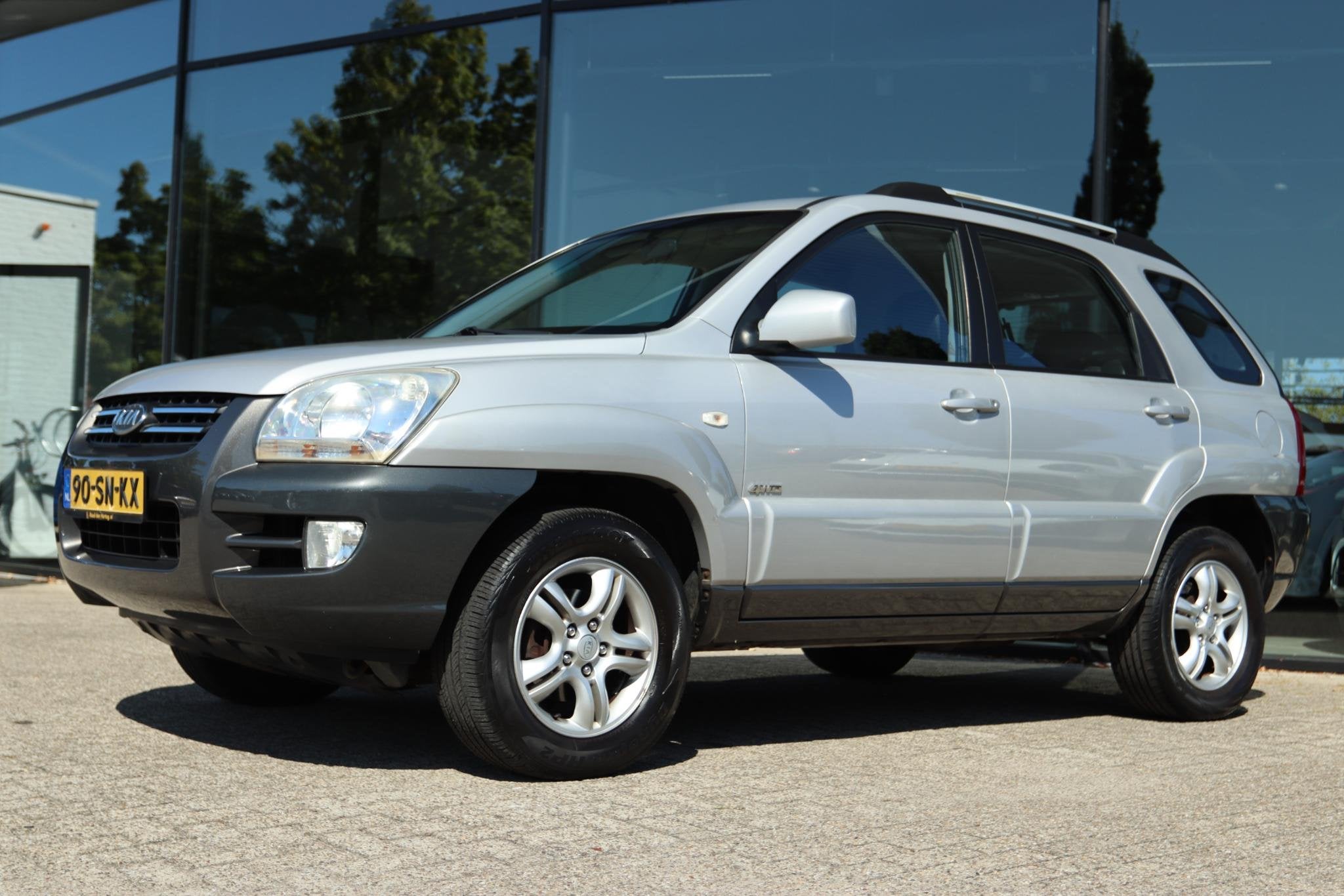 KIA SPORTAGE 2.7 V6 ADVENTURE 4WD | CRUISE | CLIMATE | TREKH, Auto's, Automaat, Stof, Gebruikt, 2656 cc
