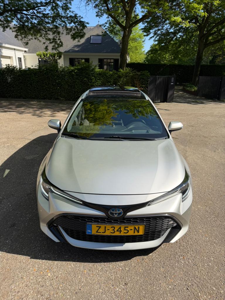 Toyota Corolla TS 2.0 Hybrid 184pk CVT 2019 Grijs, 1345 kg, 450 kg, Leder en Stof, Origineel Nederlands