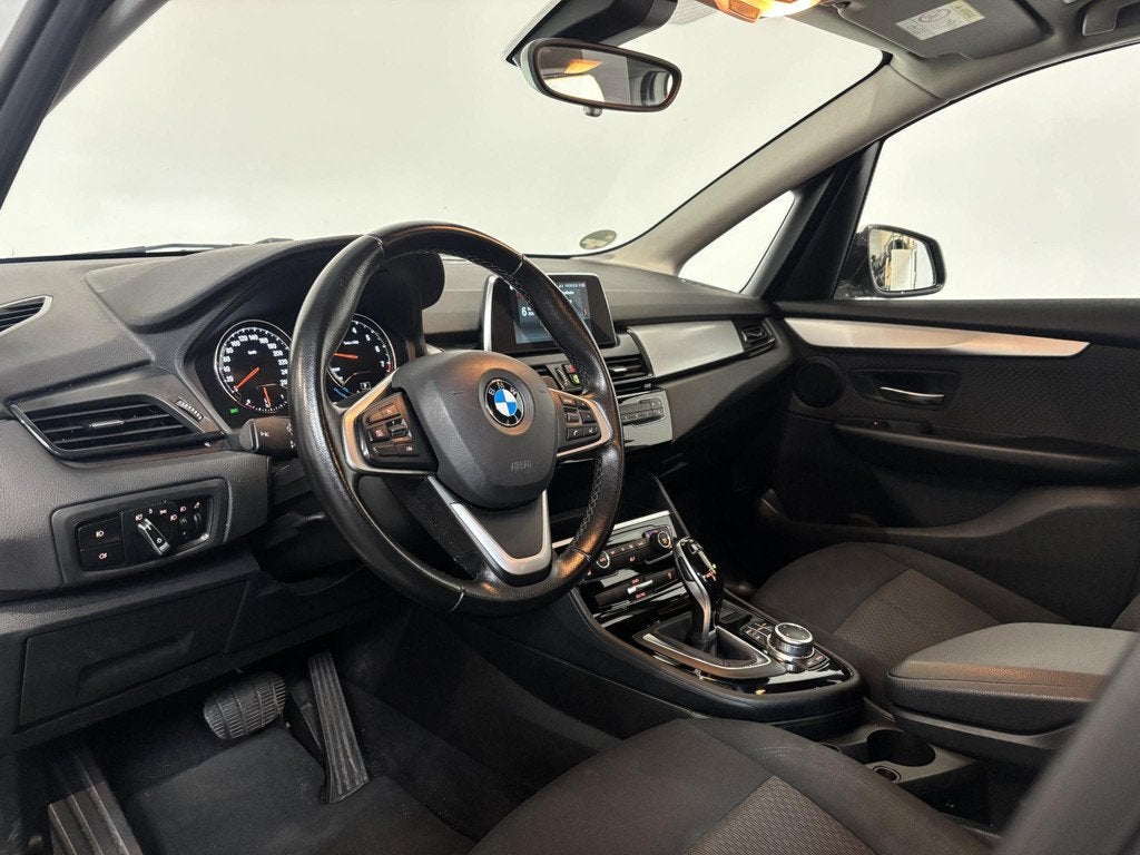 BMW 2-serie Active Tourer 218i Corporate Lease Executive Nav, Auto's, BMW, Stof, Gebruikt, Wit, Origineel Nederlands