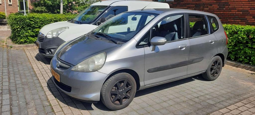 Honda Jazz 1.4 I 2005 Grijs, Voorwielaandrijving, 40 €/maand, 4 cilinders, Origineel Nederlands