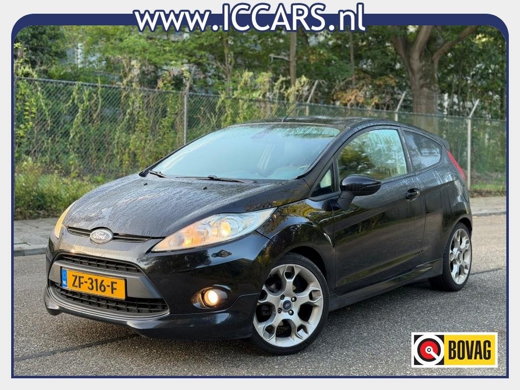 Ford FIESTA 1.6 GHIA - Leer - Clima - Cruise - Stoelverw., 1596 cc, 31 €/maand, 4 cilinders, Zwart