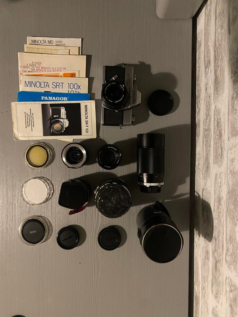 Minolta SRT 101 Spiegelreflexcamera met diverse lenzen, Audio, Tv en Foto, Fotocamera's Analoog, Ophalen of Verzenden, Gebruikt