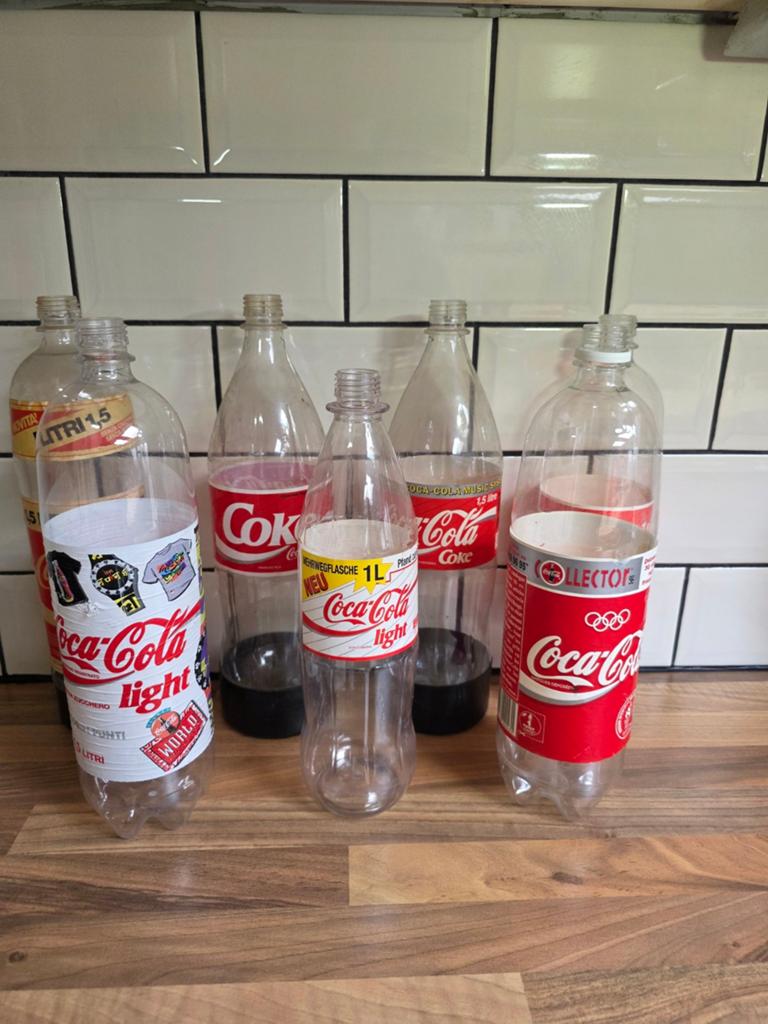 Vintage Coca-Cola flessen - 7 unieke PET-flessen, Verzamelen, Ophalen of Verzenden, Gebruikt