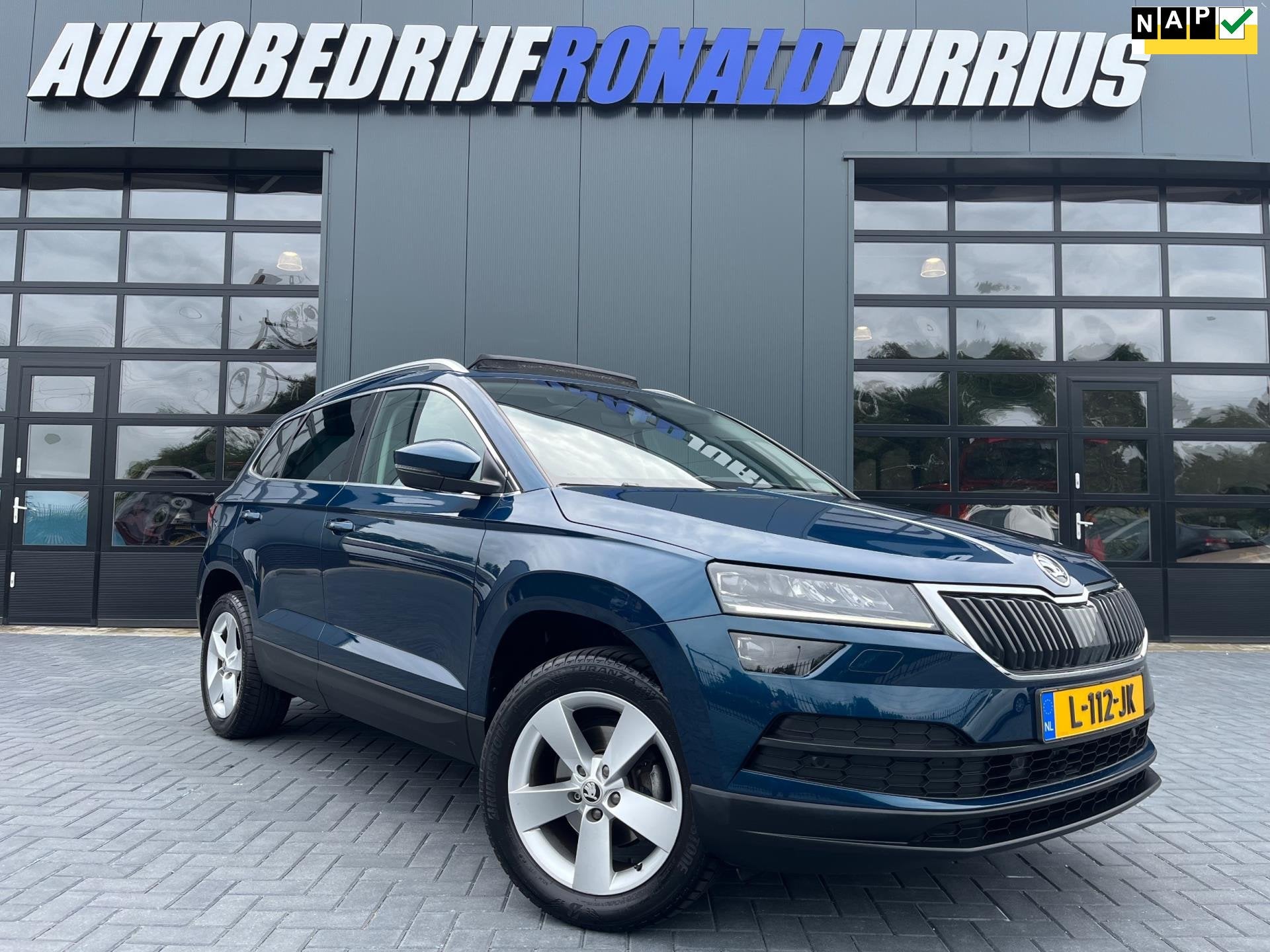 Skoda Karoq 1.0 TSI Business Edition Plus NLAuto/Panoramadak, Auto's, Voorwielaandrijving, Dealer onderhouden, Stof, Gebruikt