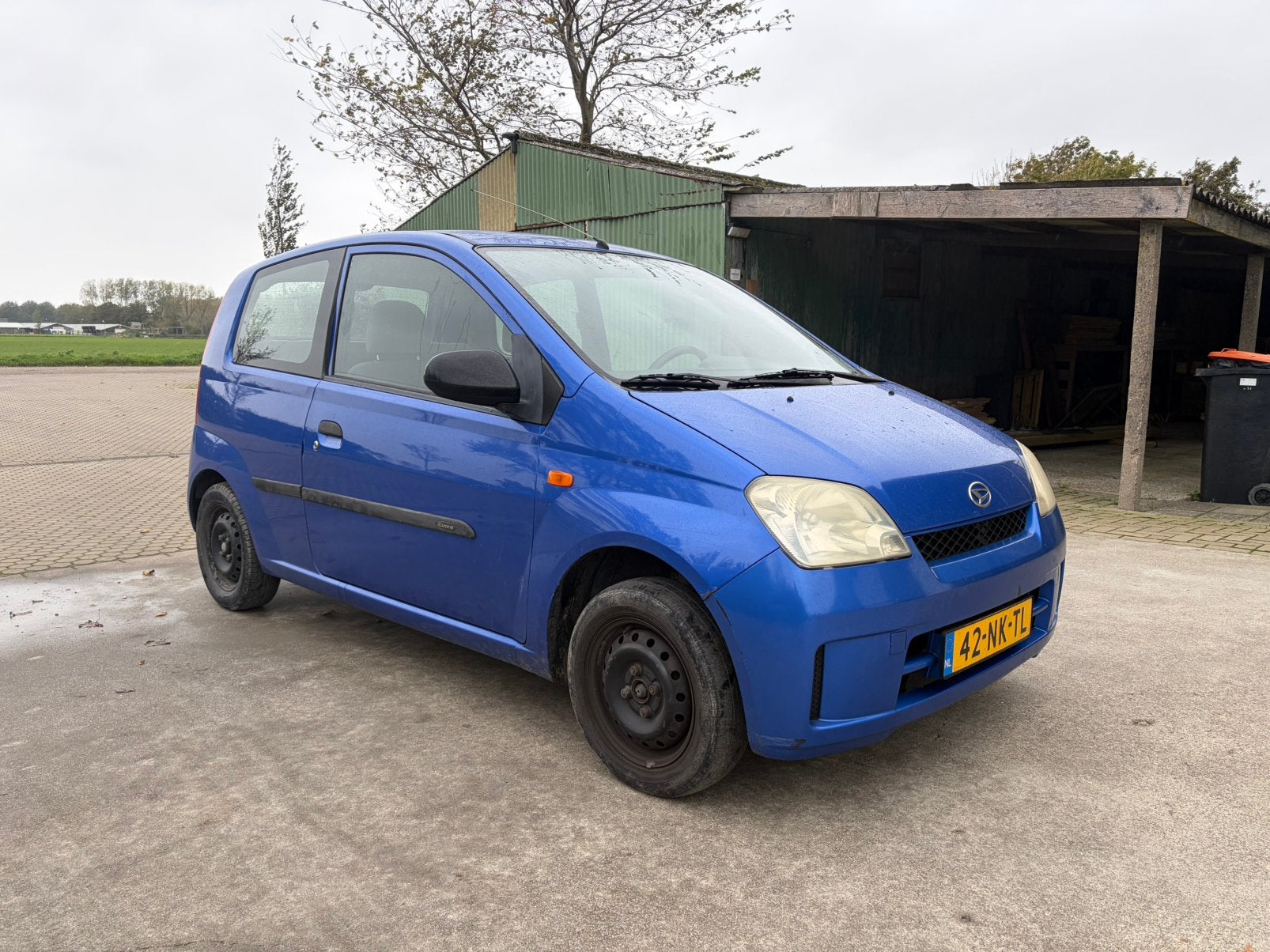 Daihatsu Cuore 1.0 3D AUT 2003 Blauw, Auto's, 600 kg, 18 €/maand, Cuore, Origineel Nederlands