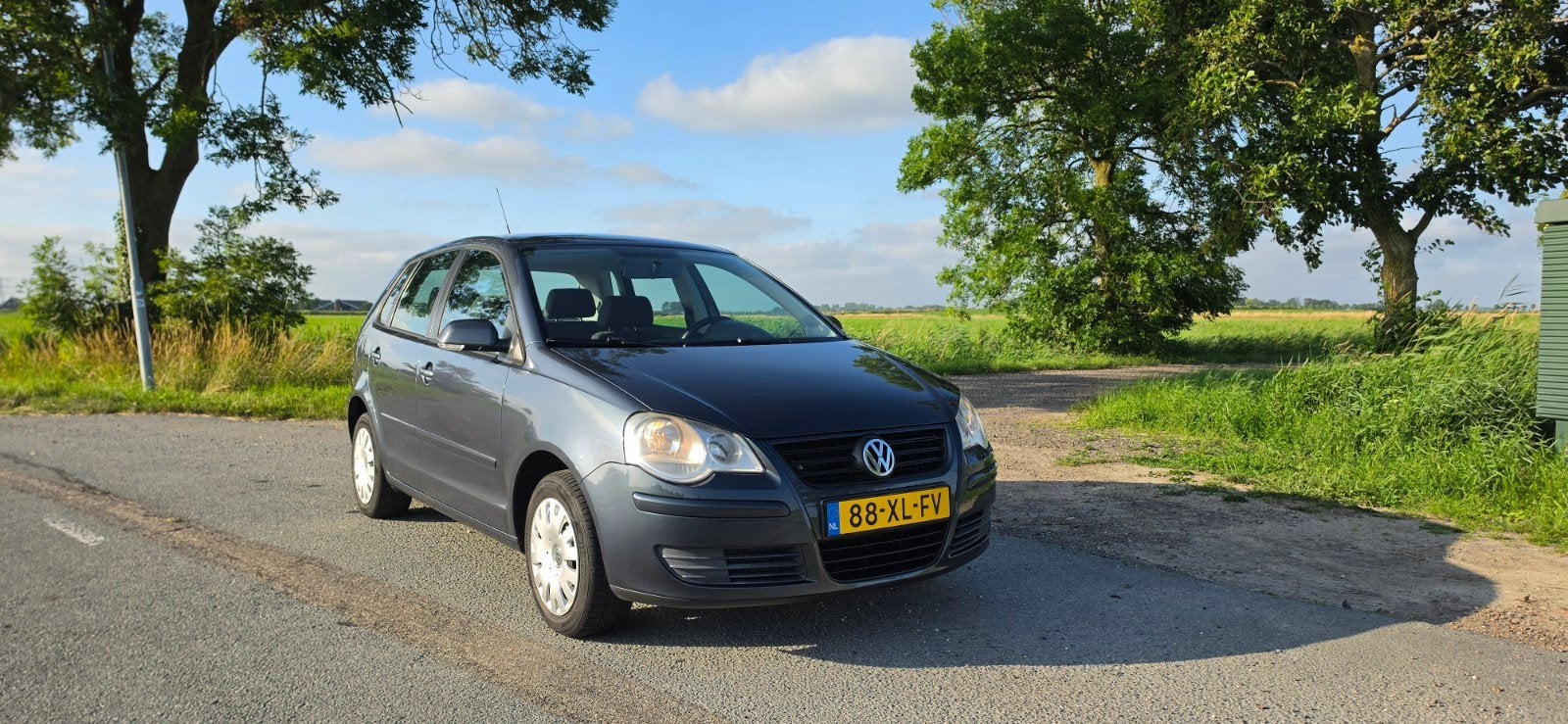Volkswagen Polo 1.4 16V 59KW 2007 Blauw, Auto's, Voorwielaandrijving, Stof, 40 €/maand, Zwart