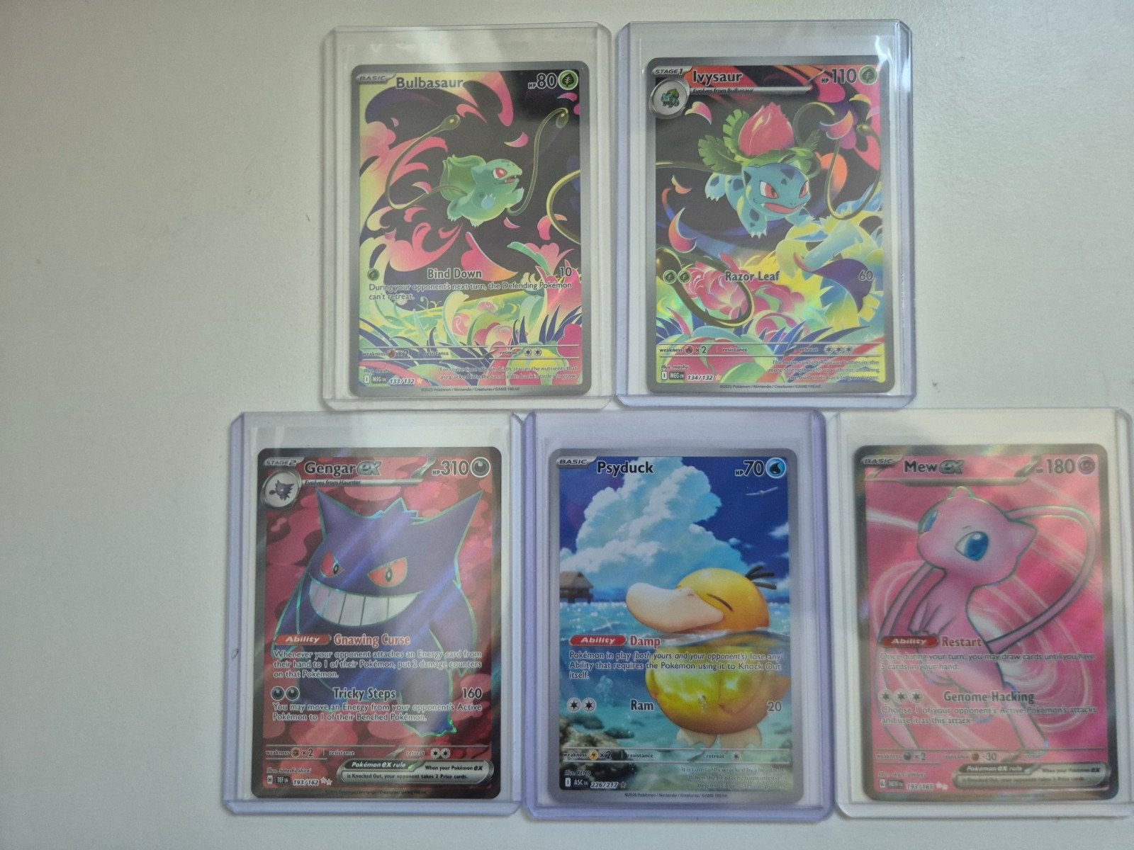 Pokemon hits - Gengar, Ivysaur, Psyduck, Mew, Bulbasaur, Ophalen of Verzenden, Zo goed als nieuw, Meerdere kaarten