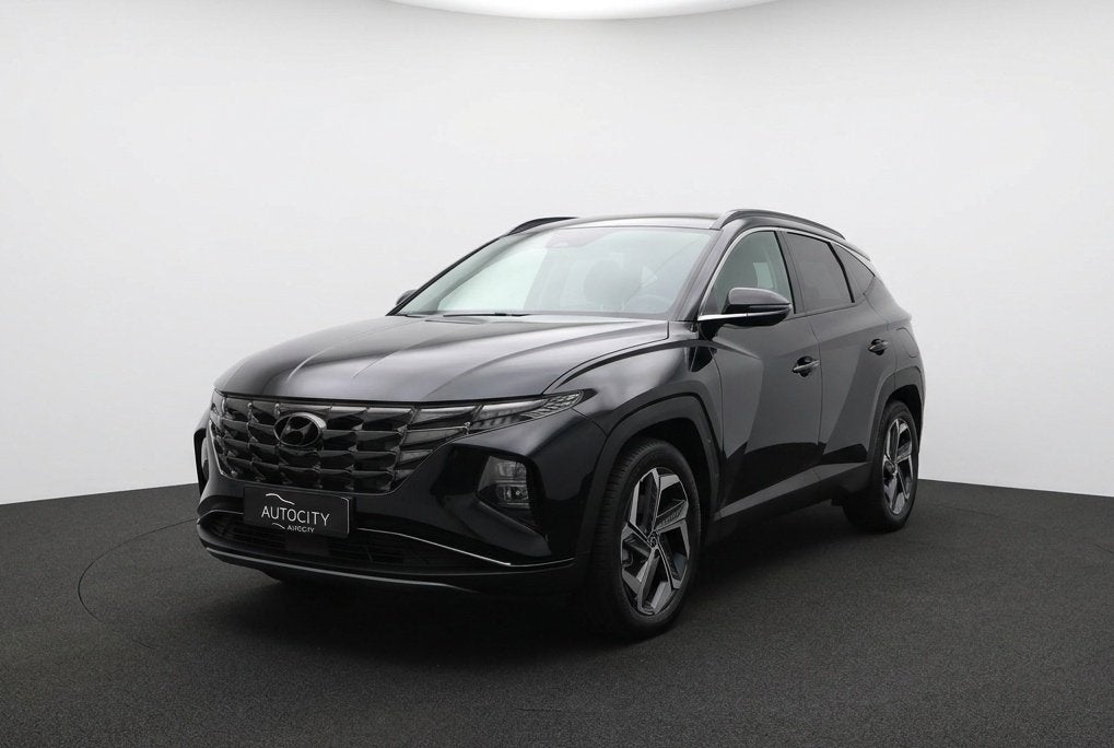 Hyundai Tucson 1.6 T-GDI HEV Premium Sky 230PK l Pano | Lede, Auto's, Hyundai, Gebruikt, Zwart, 4 cilinders, Zwart