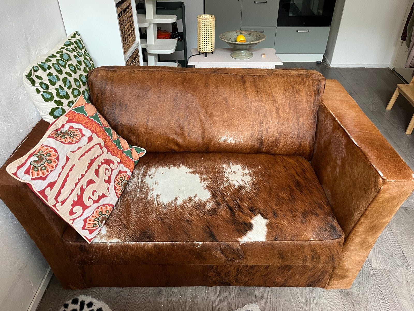 COWY Koeienhuid bank, Huis en Inrichting, Fauteuils, Ophalen, Gebruikt, 75 tot 100 cm, Leer