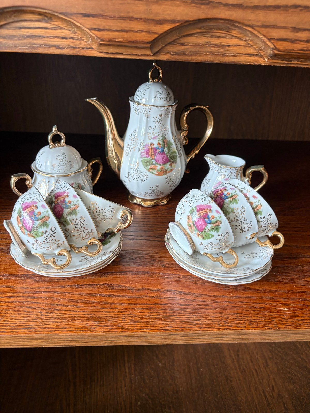 Antiek porseleinen theeservies met gouden accenten, Ophalen of Verzenden