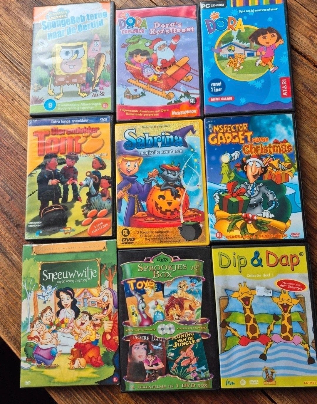 Diverse Kinder DVD's: Spongebob, Dora, Sabrina, Sneeuwwitje, Gebruikt, Animatie, Alle leeftijden, Box/collectie