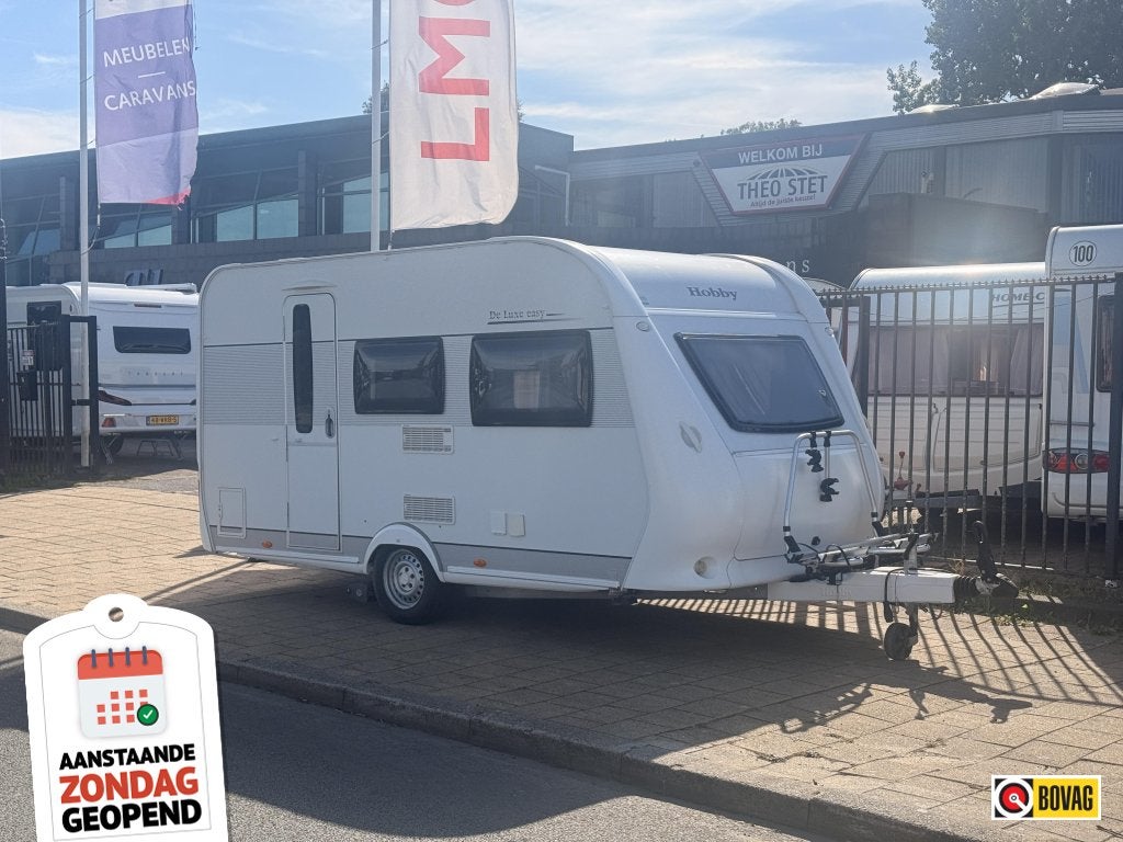 Hobby De luxe Easy 400 SF met mover en voortent!, Caravans en Kamperen, Caravans, Hobby, Bedrijf, Treinzit, 750 - 1000 kg