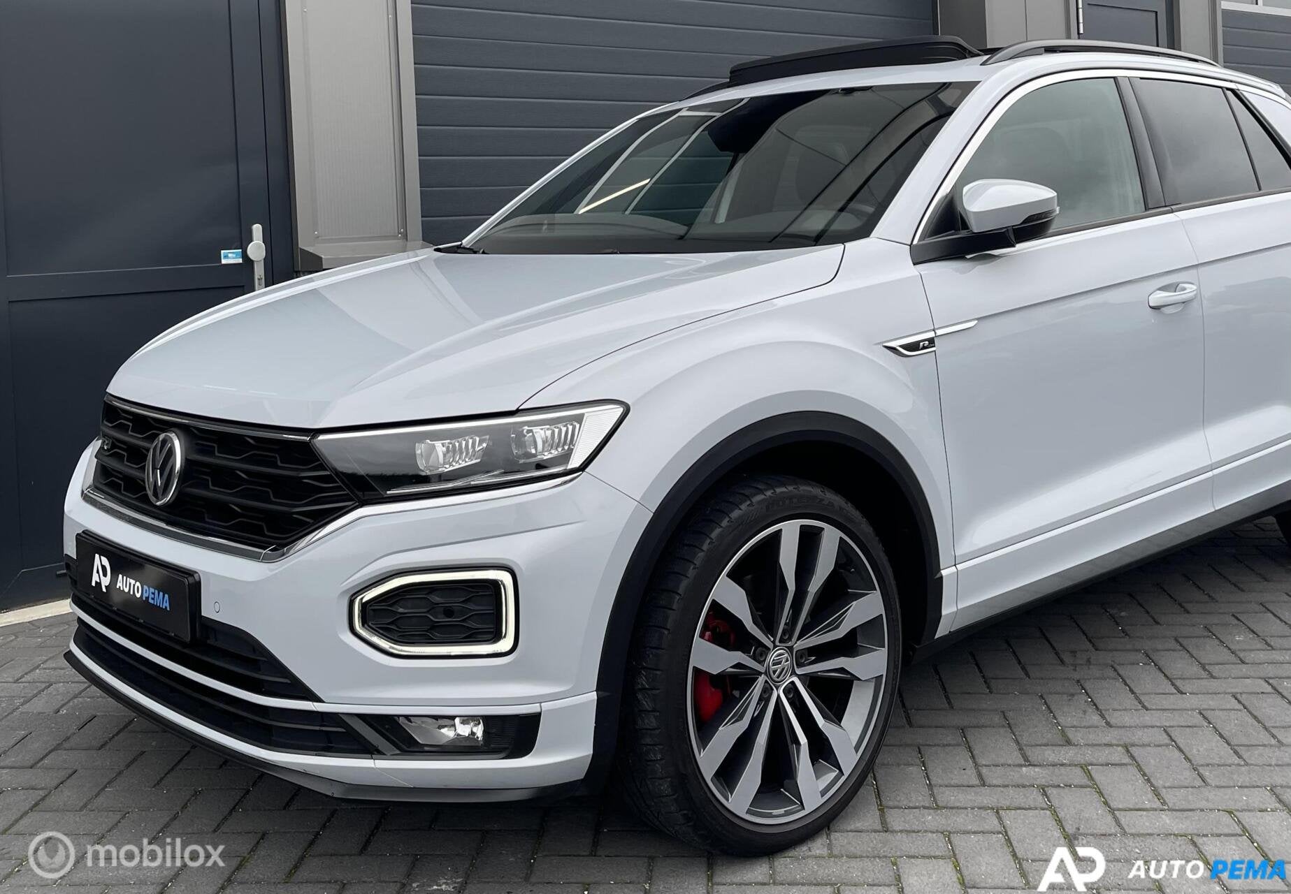 Volkswagen T-Roc 1.5 TSI DSG 3xR-Line 150PK ACC Cam, Auto's, Zwart, 4 cilinders, 150 pk, Leder en Stof
