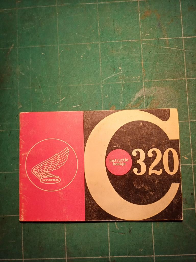HONDA C320 handboek owner’s manual origineel NL, Verzenden, Zo goed als nieuw