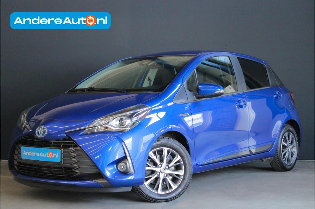 Toyota Yaris 1.5 Hybrid Y20 |stoelverwarming|navigatie|parke, Auto's, Toyota, Gebruikt, Zwart, 4 cilinders, Blauw