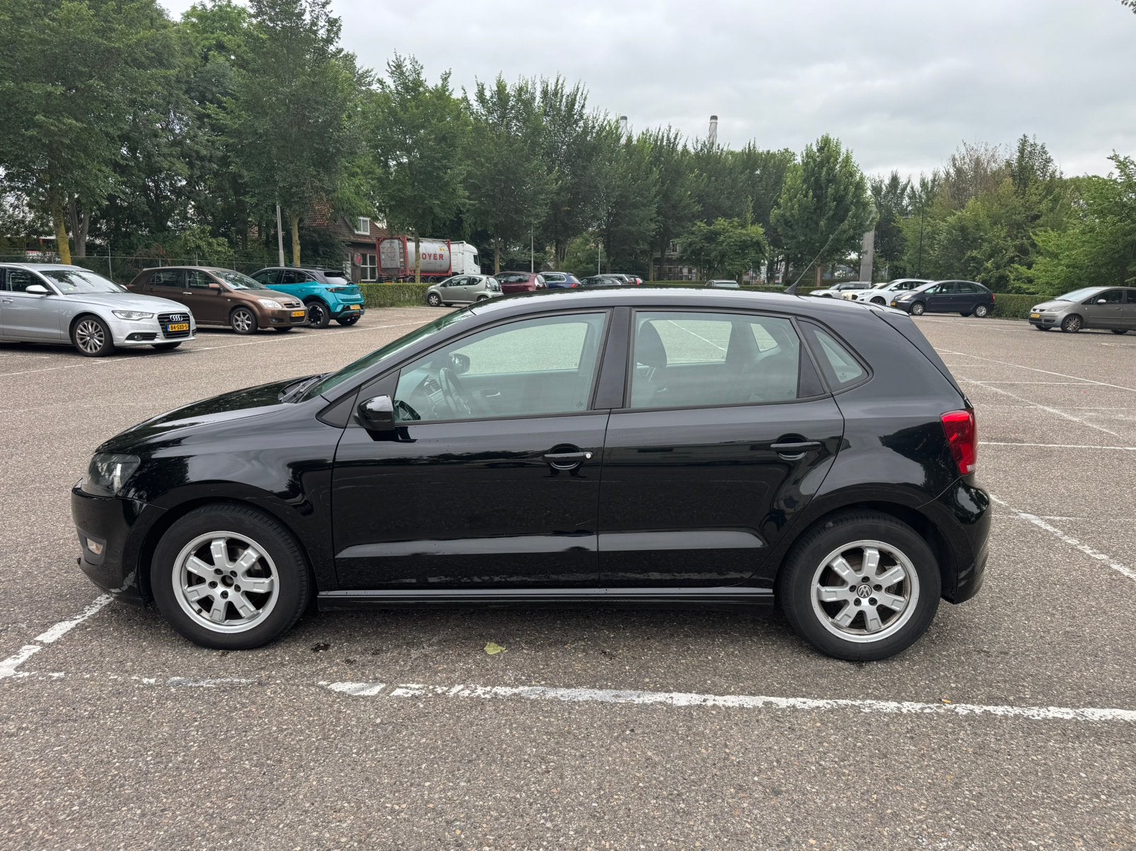 Volkswagen Polo 1.2 TDI 55KW BM 2012 Zwart, Auto's, Volkswagen, Voorwielaandrijving, Euro 5, Stof, 74 pk