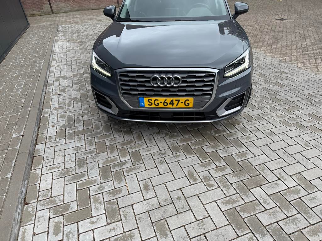 Audi Q2 1.0 Tfsi 116pk S Tronic 2018 Grijs automaat, Auto's, Audi, 650 kg, Particulier, 3 cilinders, SUV of Terreinwagen