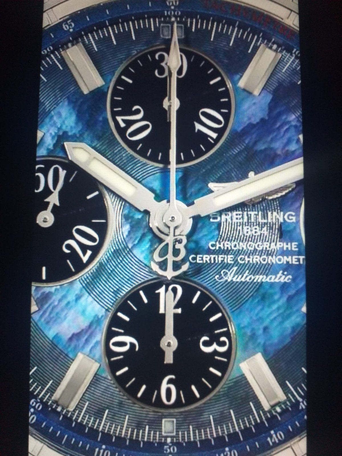 Unieke Breitling Evolution met blauw parelmoeren wijzerplaat, Sieraden, Tassen en Uiterlijk, Horloges | Heren, Ophalen of Verzenden